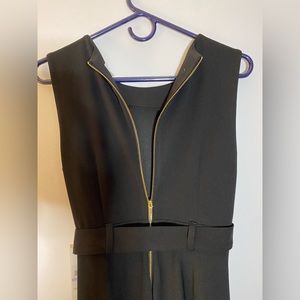 Calvin Klein black dress. Zipper back. Size 6. Never worn.